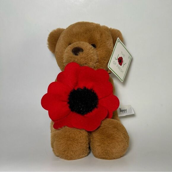 NWT Aurora Plush Brown Soft Teddy Bear Stuffed Animal Holding A Poppy  12" - Picture 1 of 9